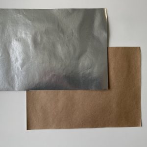 Thermal insulation paper laminate: brown kraft paper 70 gsm + 12 gsm LDPE + 6.35 mic ALU, 1025 mm